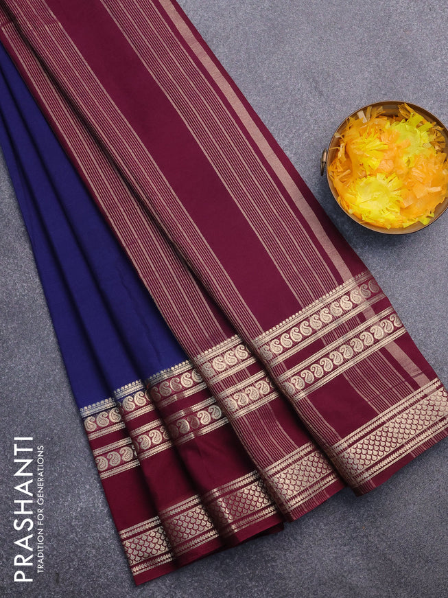 Semi crepe saree dark blue and wine shade with plain body and long rettapet zari woven border