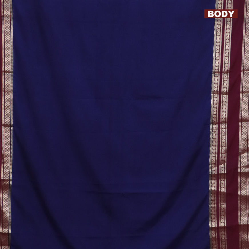 Semi crepe saree dark blue and wine shade with plain body and long rettapet zari woven border