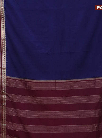 Semi crepe saree dark blue and wine shade with plain body and long rettapet zari woven border