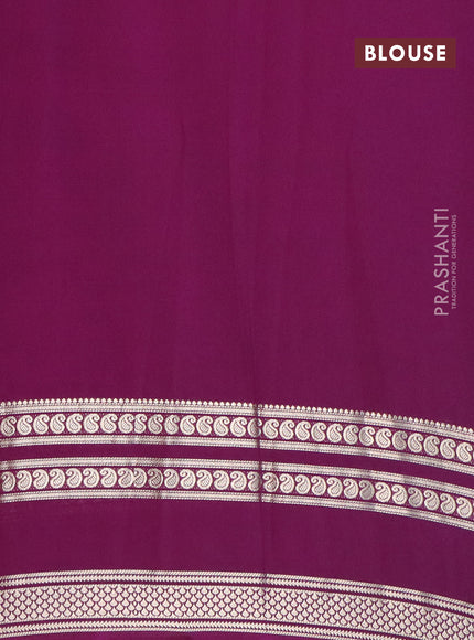 Semi crepe saree teal green and purple with plain body and long rettapet zari woven border