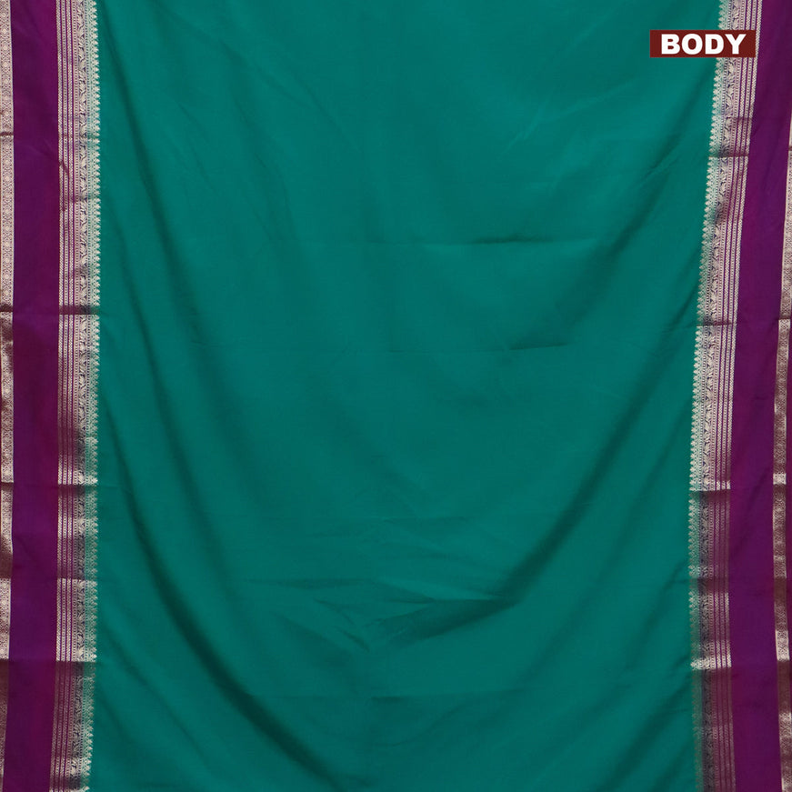 Semi crepe saree teal blue shade and purple with plain body and rettapet zari woven border