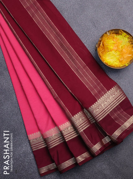 Semi crepe saree peach pink and wine shade with plain body and rettapet zari woven border