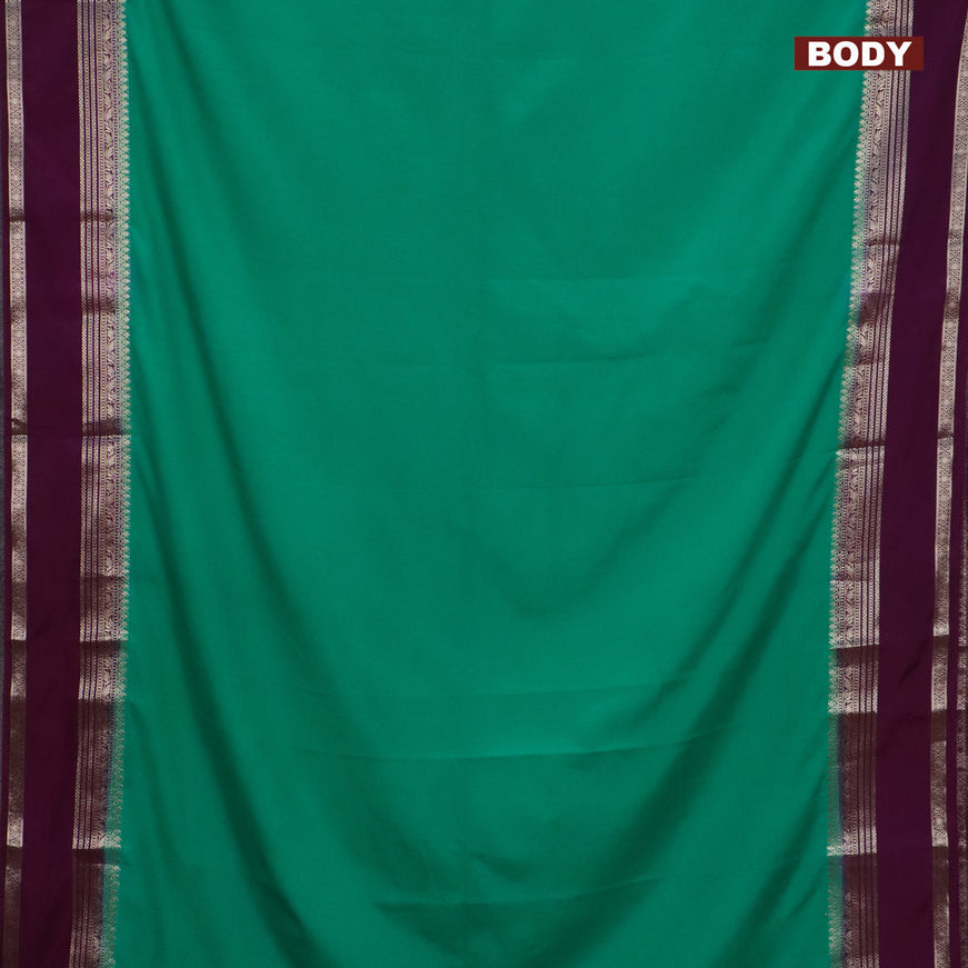 Semi crepe saree teal green and purple with plain body and rettapet zari woven border