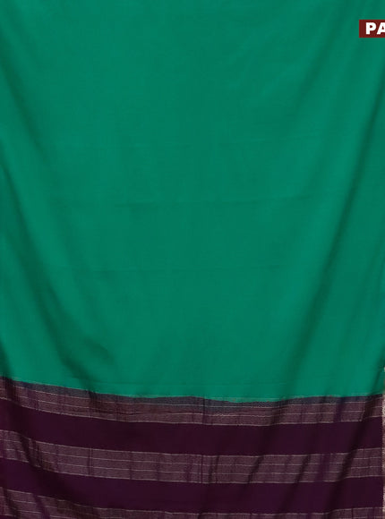 Semi crepe saree teal green and purple with plain body and rettapet zari woven border