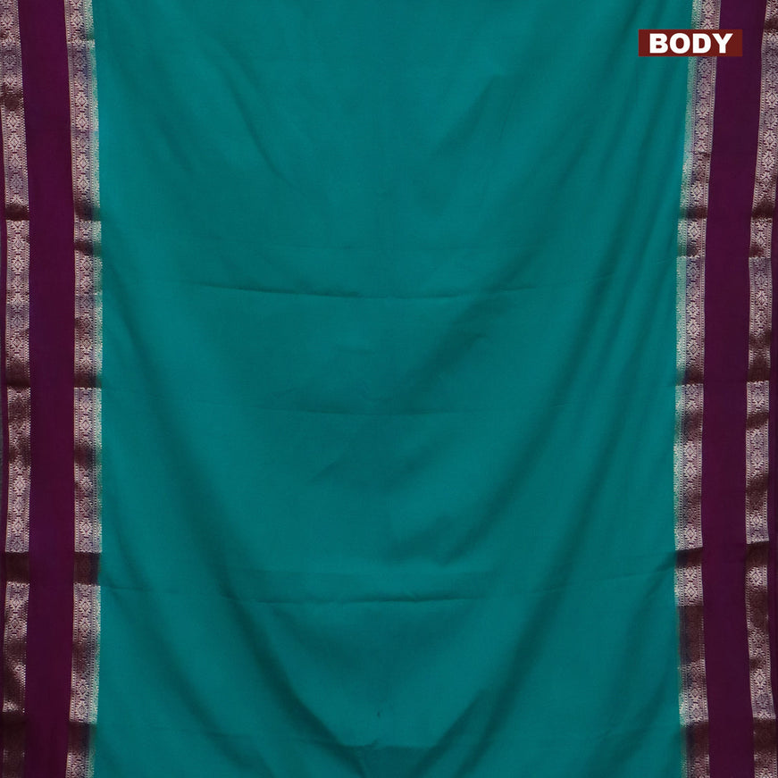 Semi crepe saree teal blue and purple with plain body and rettapet zari woven border