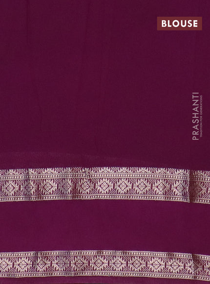 Semi crepe saree teal blue and purple with plain body and rettapet zari woven border