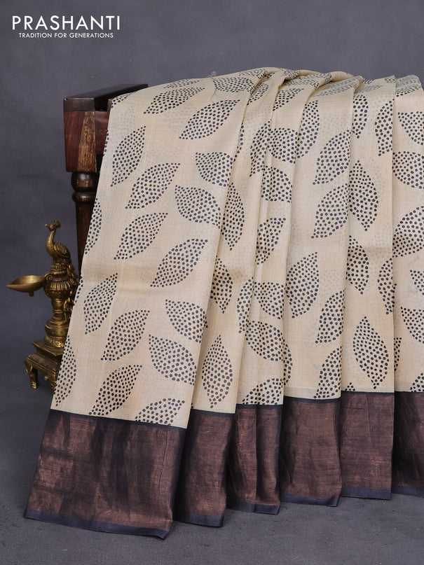 Pure tussar silk saree cream and elephant grey with allover prints and zari woven border