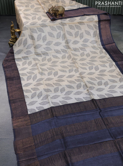 Pure tussar silk saree beige with allover floral prints and zari woven border