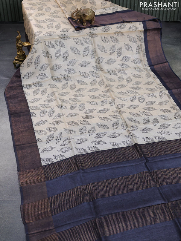 Pure tussar silk saree cream and elephant grey with allover prints and zari woven border