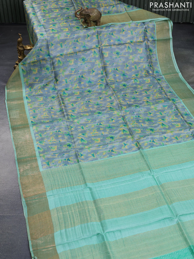 Pure tussar silk saree grey and pastel blue with allover prints and zari woven border