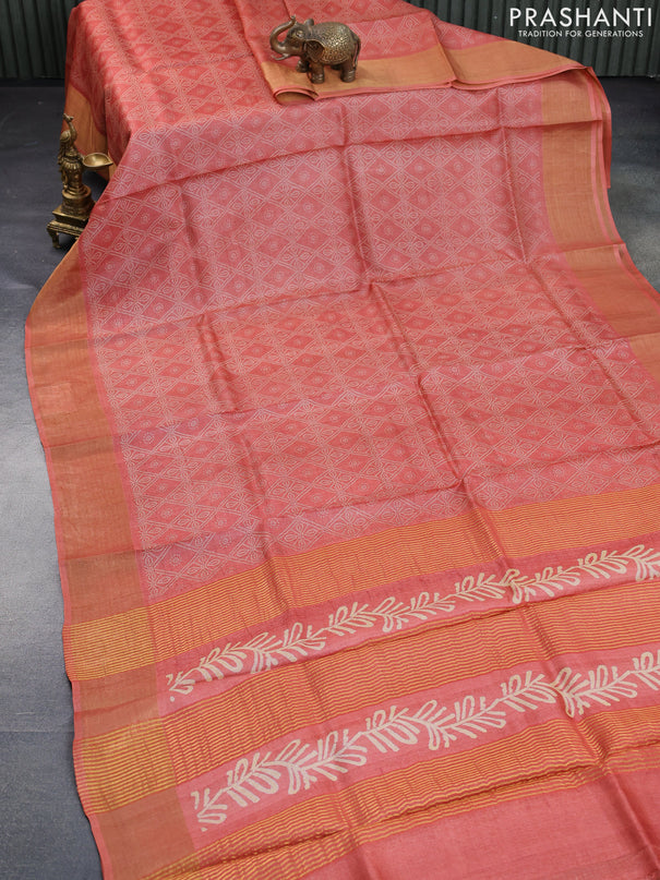 Pure tussar silk saree rustic orange with allover bandhani prints and zari woven border