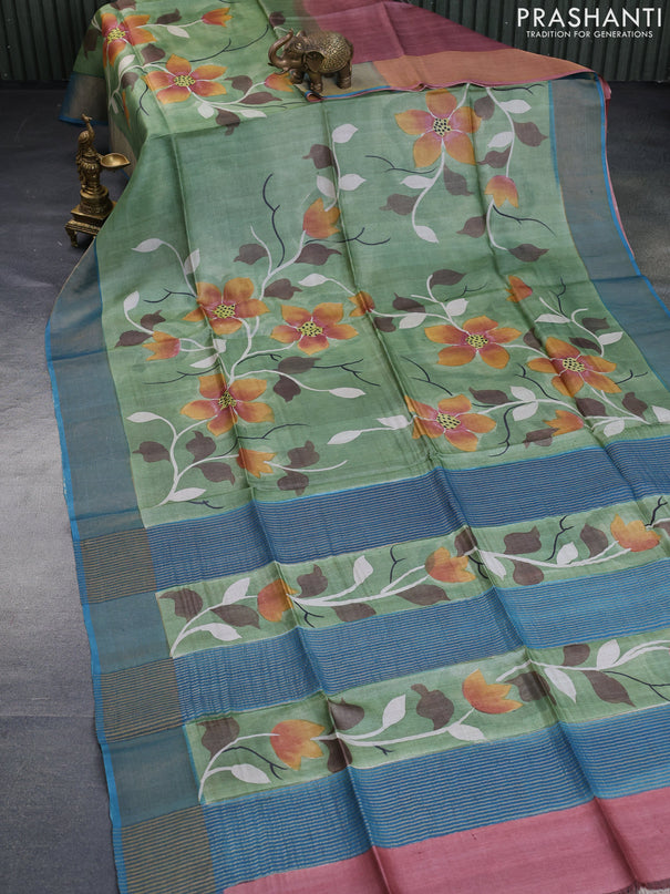 Pure tussar silk saree pastel green and peacock blue with allover floral hand painted prints and zari woven border