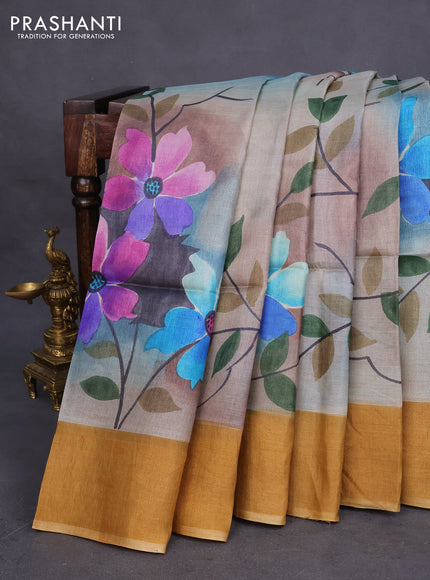 Pure tussar silk saree multi colour and mustard shade with allover floral hand painted prints and zari woven border