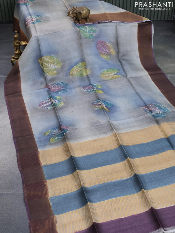 Pure tussar silk saree grey and deep jamun shade with allover hand painted prints and zari woven border