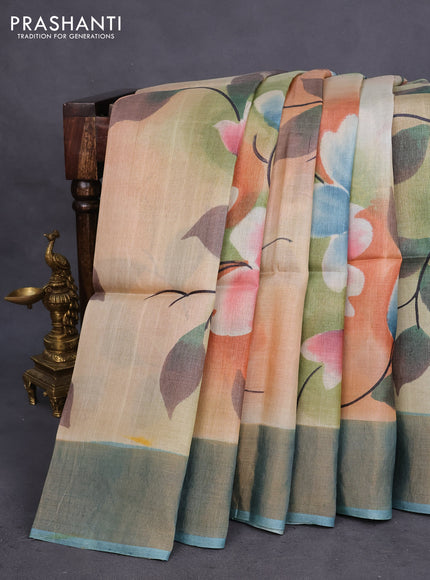 Pure tussar silk saree multi colour and pastel blue with allover floral hand painted prints and zari woven border