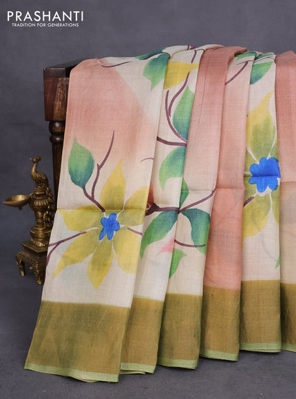 Pure tussar silk saree pastel peach shade and pastel green with allover floral hand painted prints and zari woven border