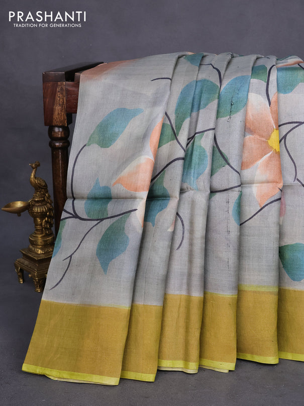 Pure tussar silk saree grey and lime green with allover floral hand painted prints and zari woven border