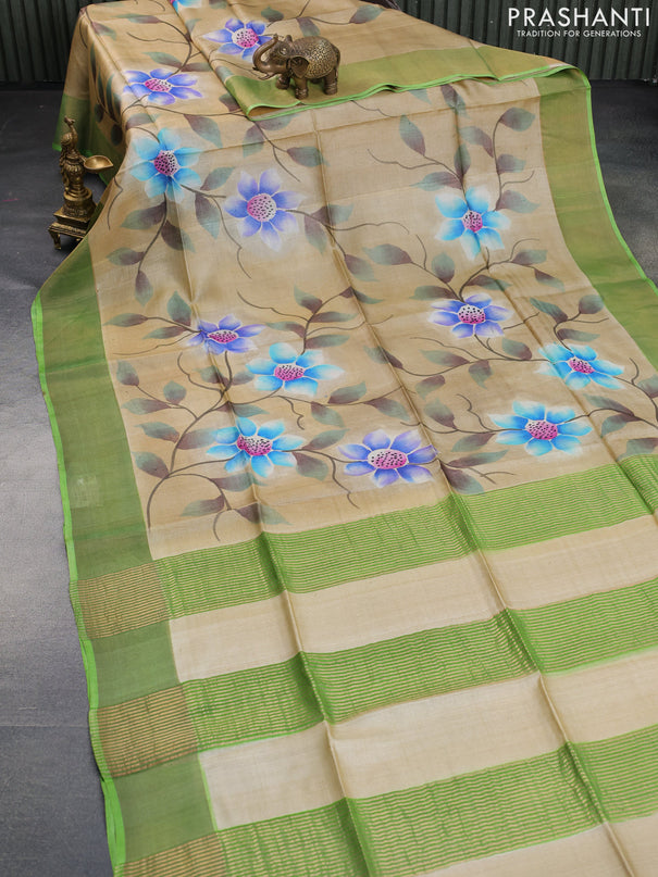 Pure tussar silk saree sandal and green with allover floral hand painted prints and zari woven border