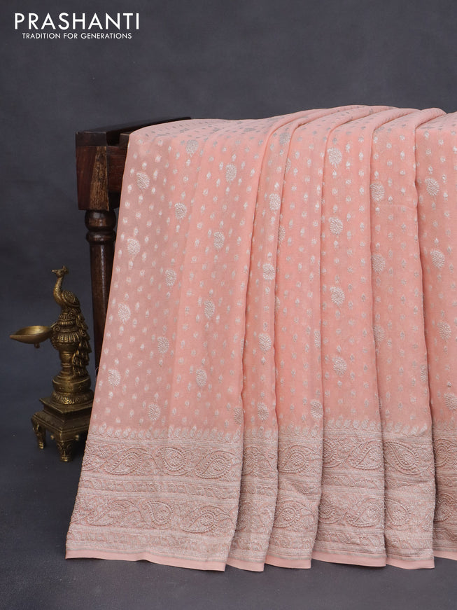 Banarasi georgette saree pastel peach orange with allover thread & zari weaves and woven border