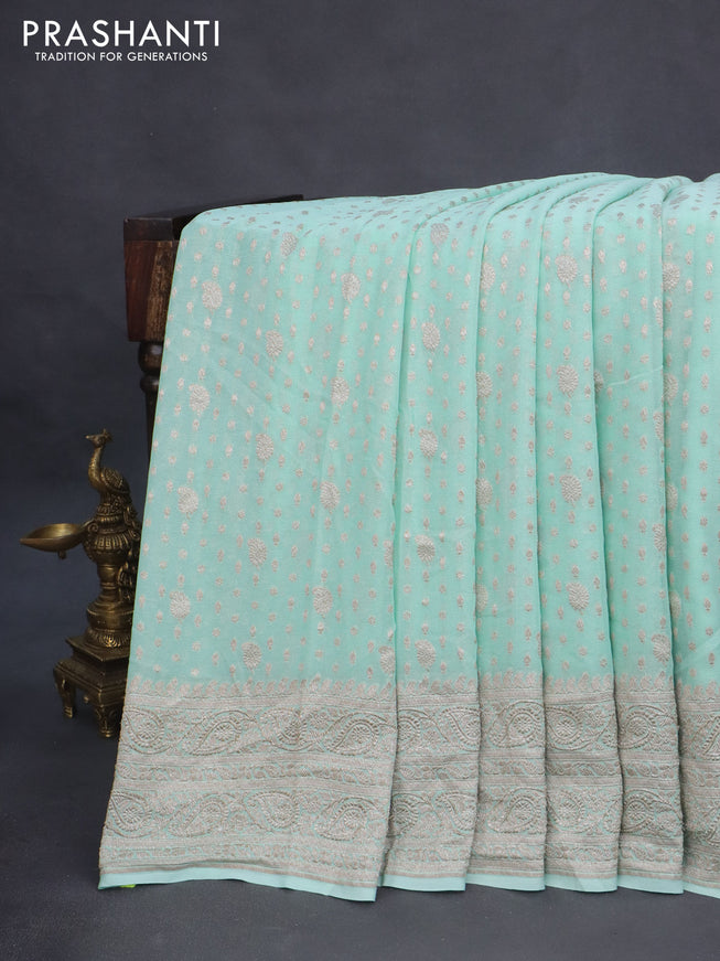 Banarasi georgette saree pastel green with allover thread & zari weaves and woven border