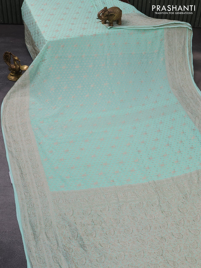 Banarasi georgette saree pastel green with allover thread & zari weaves and woven border