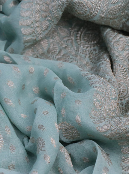 Banarasi georgette saree pastel blue shade with allover thread & zari weaves and woven border