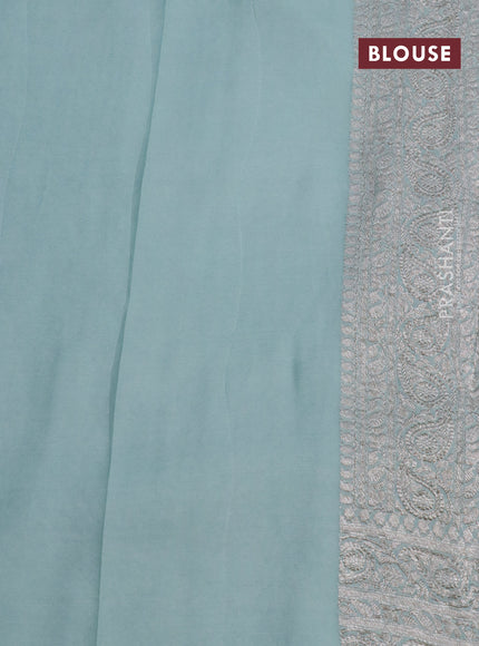 Banarasi georgette saree pastel blue shade with allover thread & zari weaves and woven border