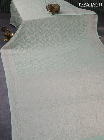 Banarasi georgette saree pastel green with allover thread & zari weaves and woven border