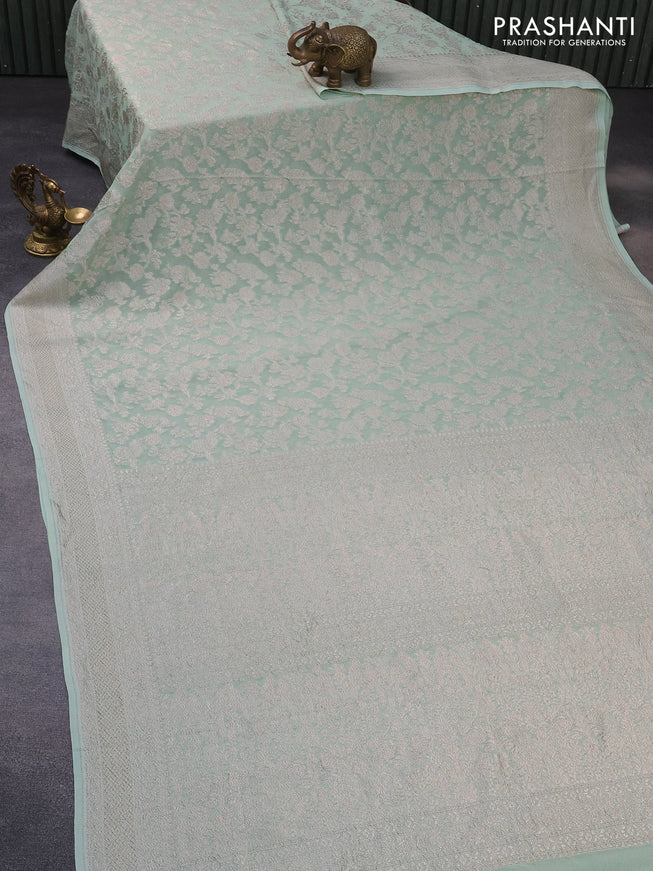 Banarasi georgette saree pastel green with allover thread & zari weaves and woven border