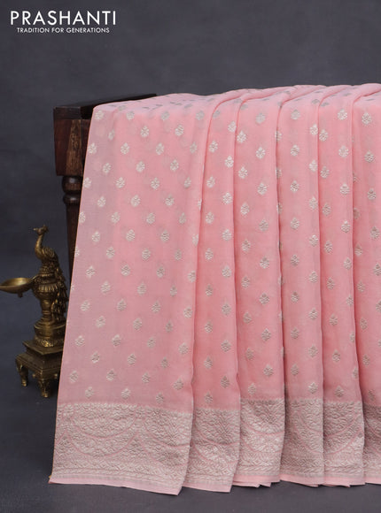 Banarasi georgette saree peach pink with allover thread & zari weaves and woven border