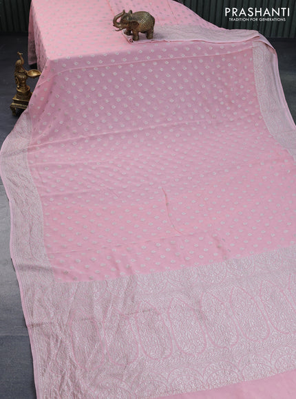 Banarasi georgette saree peach pink with allover thread & zari weaves and woven border