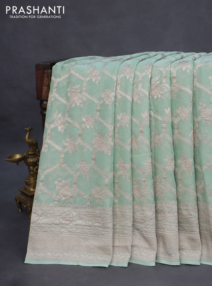 Banarasi georgette saree pastel green with allover thread & zari weaves and woven border