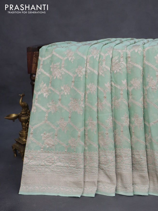 Banarasi georgette saree pastel green with allover thread & zari weaves and woven border