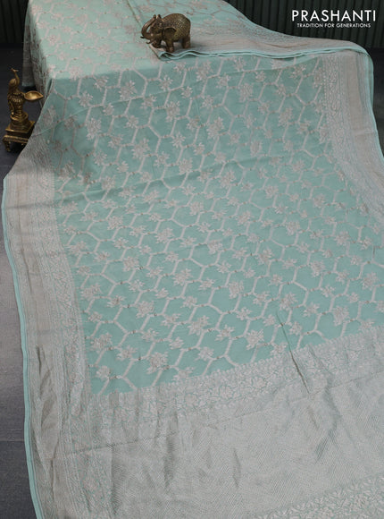 Banarasi georgette saree pastel green with allover thread & zari weaves and woven border