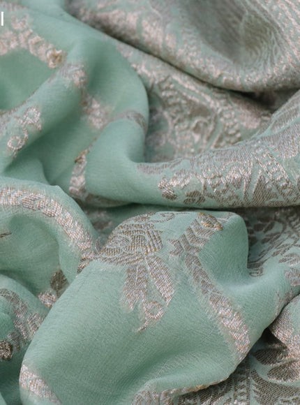 Banarasi georgette saree pastel green with allover thread & zari weaves and woven border