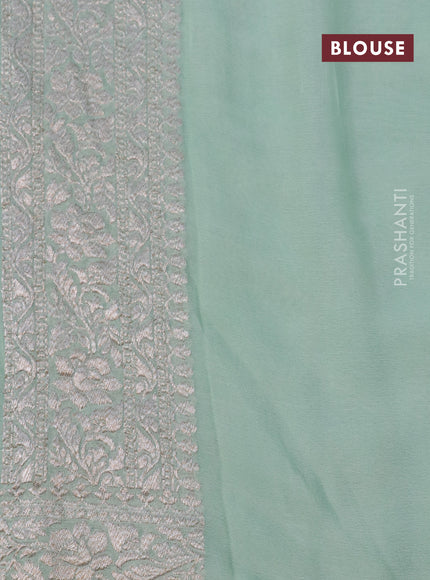 Banarasi georgette saree pastel green with allover thread & zari weaves and woven border