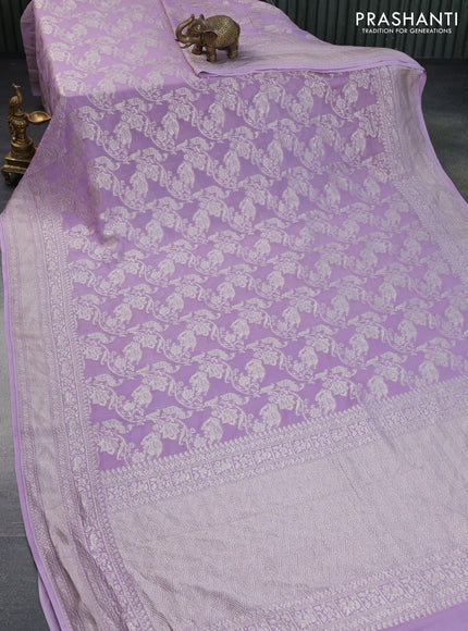 Banarasi georgette saree lavender shade with allover thread & zari weaves and woven border