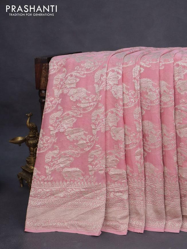 Banarasi georgette saree pink shade with allover thread & zari weaves and woven border