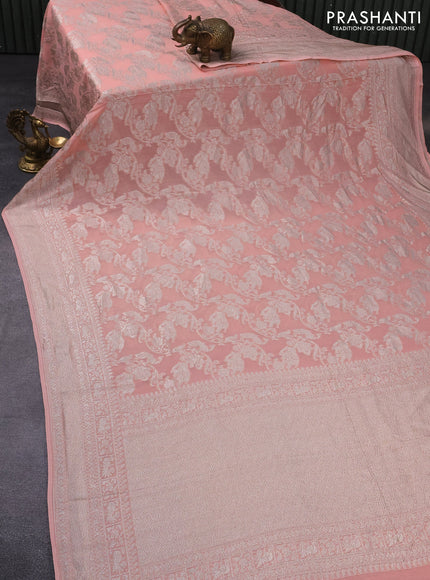 Banarasi georgette saree peach orange with allover thread & zari weaves and woven border