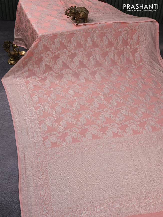 Banarasi georgette saree peach orange with allover thread & zari weaves and woven border