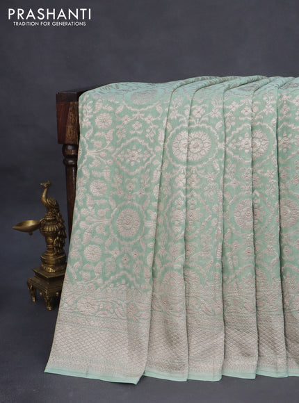 Banarasi georgette saree pastel green with allover thread & zari weaves and woven border