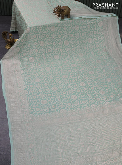 Banarasi georgette saree pastel green with allover thread & zari weaves and woven border