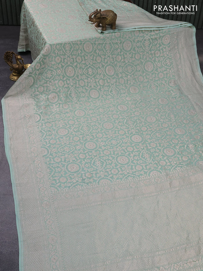 Banarasi georgette saree pastel green with allover thread & zari weaves and woven border