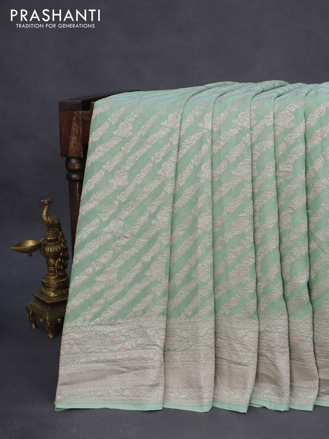 Banarasi georgette saree pastel green with allover thread & zari weaves and woven border