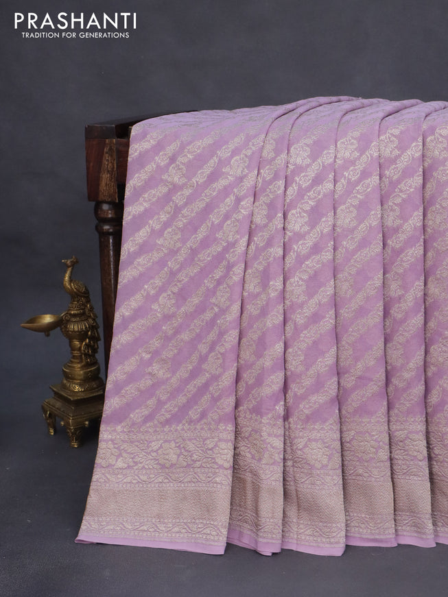 Banarasi georgette saree lavender shade with allover thread & zari weaves and woven border