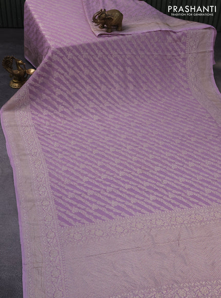 Banarasi georgette saree lavender shade with allover thread & zari weaves and woven border