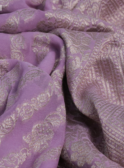 Banarasi georgette saree lavender shade with allover thread & zari weaves and woven border