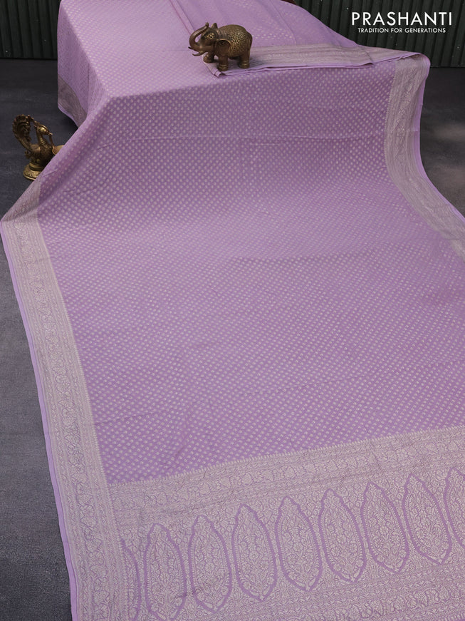 Banarasi georgette saree pastel lavender shade with allover thread & zari weaves and woven border