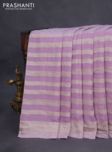 Banarasi georgette saree lavender shade with allover thread & zari weaves and woven border