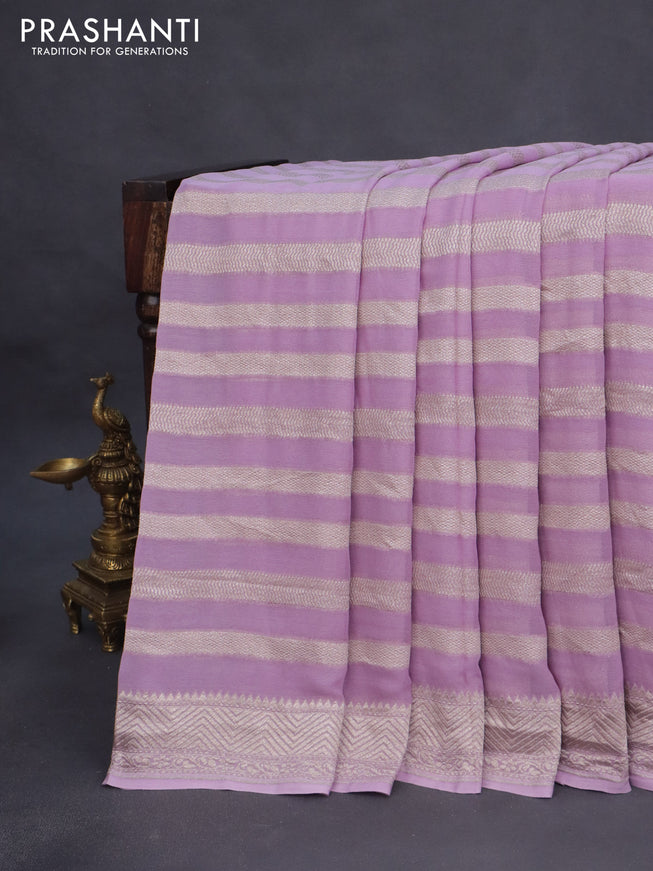 Banarasi georgette saree lavender shade with allover thread & zari weaves and woven border